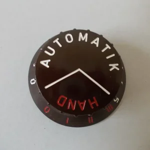 Botão automático de forno permanente no forno de carvão preto