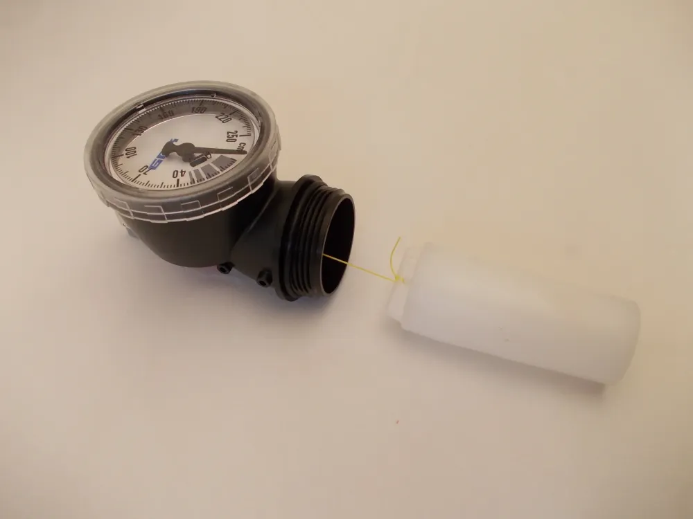 Indicador de nível mecânico para tanque de óleo com um nadador