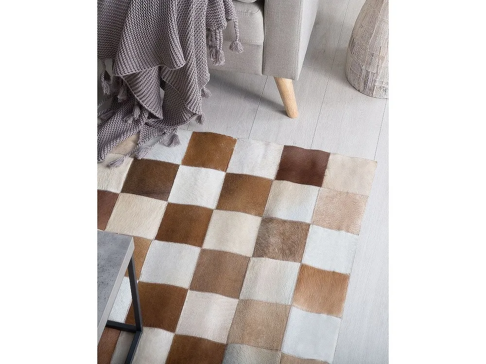 Tapete de pele genuína castanha e creme 160 x 230 cm SOLMAZ